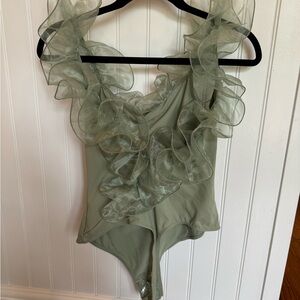 Free people intimately tulle bodysuit, new with tags. Size large. Sage green